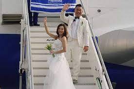 ازدواج زوج چینی در آسمان امارات